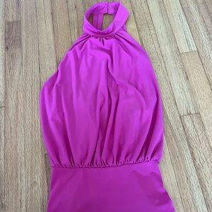 Pink high neck top with open back